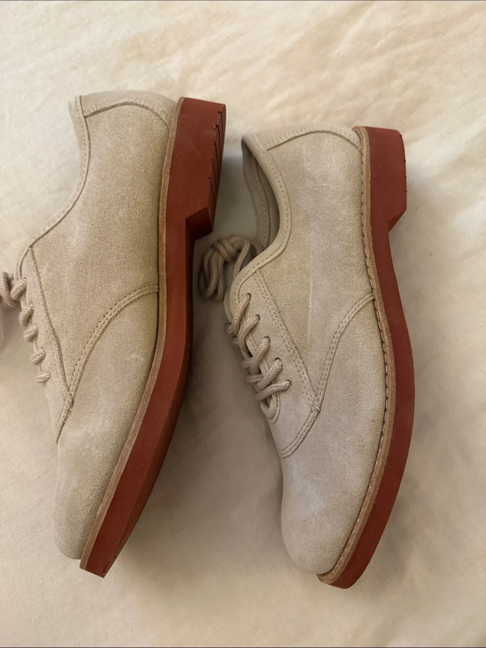 Beige Suede Lace-Up loafers.
